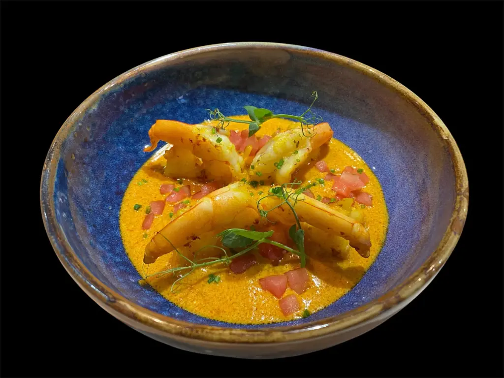 Black Tiger scampi's in  rode curry saus