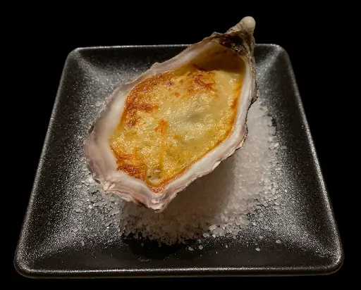 Gegratineerde oester (per stuk)